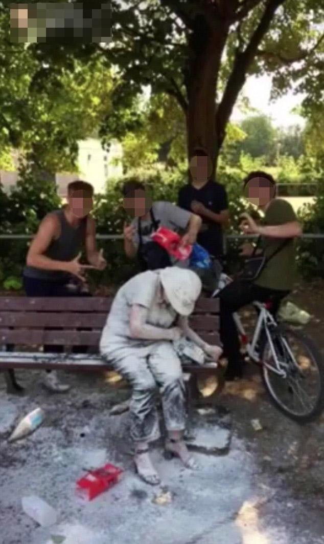 Internet is fuming after teenagers pose after attacking disabled woman with eggs and flour